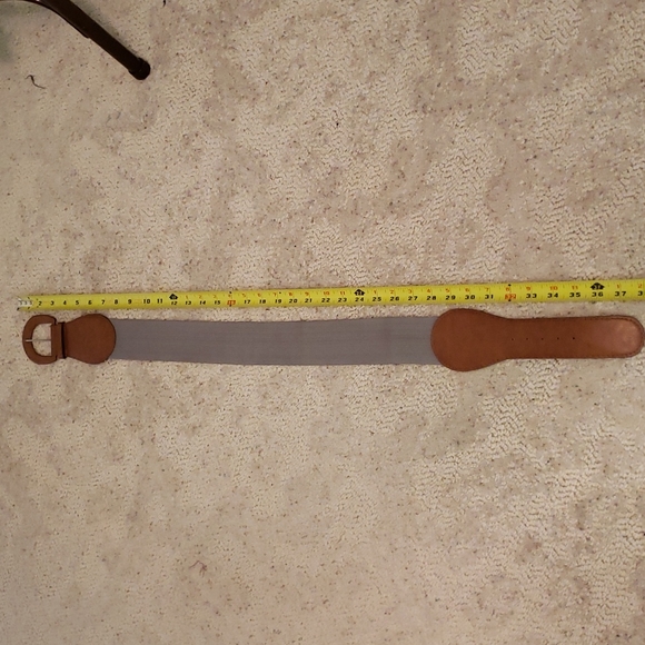 This belt is in excellent condition. It is 38in and stretches up to 52in. - Picture 5 of 5